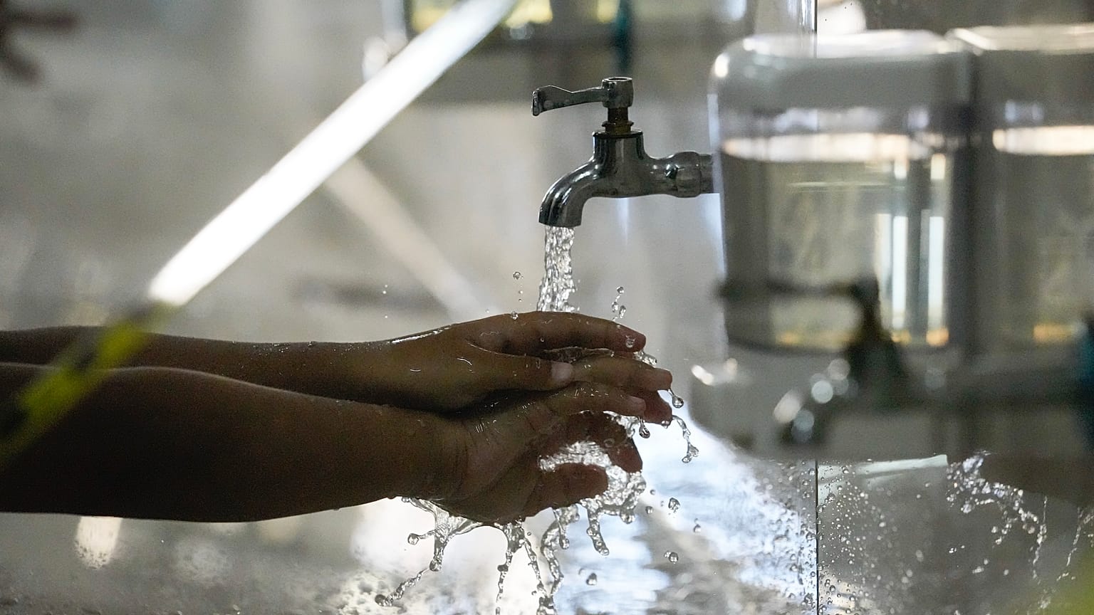 A student washes hands as part of health protocols during COVID-19 outbreak in Makati city, Philippines on Monday, Dec. 6, 2021. (File Photo)