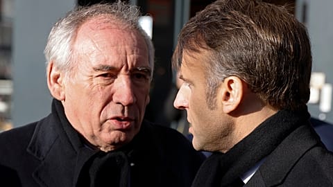 Prime Minister Francois Bayrou (left) talking to French President Emmanuel Macron, right 