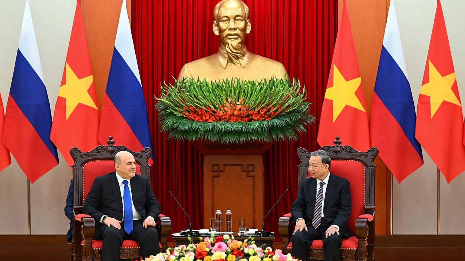 Russian Prime Minister Mikhail Mishustin, left, and Vietnamese General Secretary of the Communist Party To Lam shake hands in Hanoi, Vietnam, Tuesday, 14 Jan 2025. 