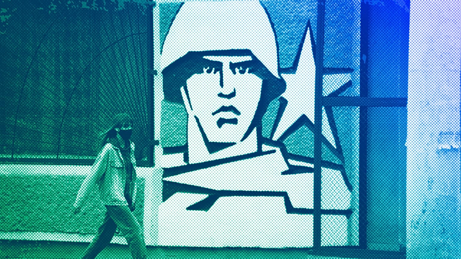 FILE: A woman walks past the Operational Group of Russian Forces headquarters in Tiraspol, the capital of the breakaway region of Transnistria, in Moldova, 1 November, 2021