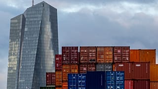 Containers are stacked at the cargo terminal near the European Central Bank, in Frankfurt, Germany, Friday, Dec. 6, 2024