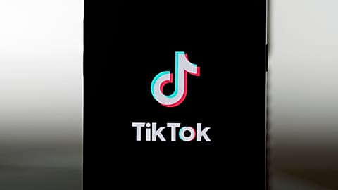 A TikTok logo is shown on a phone in San Francisco, Friday, January 17, 2025.