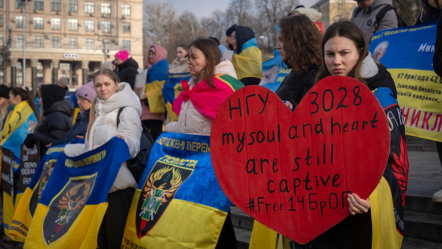 People attend a rally demanding to free Ukrainian prisoners of war who are held in captivity in Russia, at Independence Square in Kyiv, Ukraine, Saturday, Jan. 18, 2025.