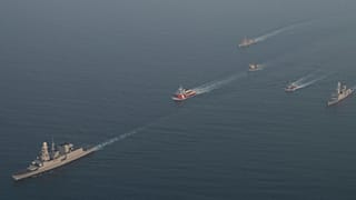 Warships escort salvage ships on 14 September, 2024, in the Red Sea as part of the EU's Operation Aspides.