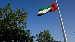 العلم الوطني للإمارات يرفرف في دار الاتحاد، في دبي، الجمعة 13 مايو 2022.