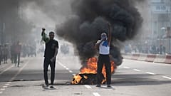 Люди протестуют в Киншасе, 28 января 2025 года