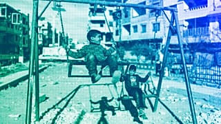  Children play in the town of Harasta, which saw fierce fighting during the war between opposition forces and the Assad regime, on the outskirts of Damascus, January 2025
