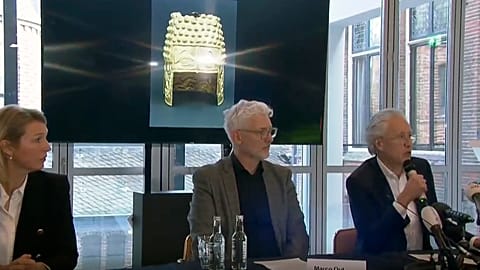 Drents Museum director Harry Tupan speaks at a press conference before an image of the Cotofenesti helmet in Assen, Netherlands.