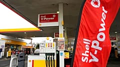 A flag flies at a shell petrol station in London, Thursday, Feb. 2, 2023. 