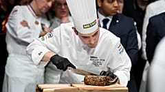 France's Bocuse d'Or winning chef Paul Marcon in action at the 2025 final