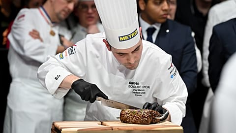 France's Bocuse d'Or winning chef Paul Marcon in action at the 2025 final