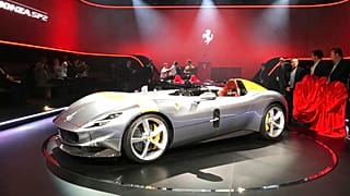 FILE - In this Sept. 18, 2018 file photo, the Ferrari Monza SP1 car is displayed in Maranello, Italy