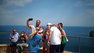 TikTok visitor stampedes have forced towns to cap bus numbers and block off iconic views.