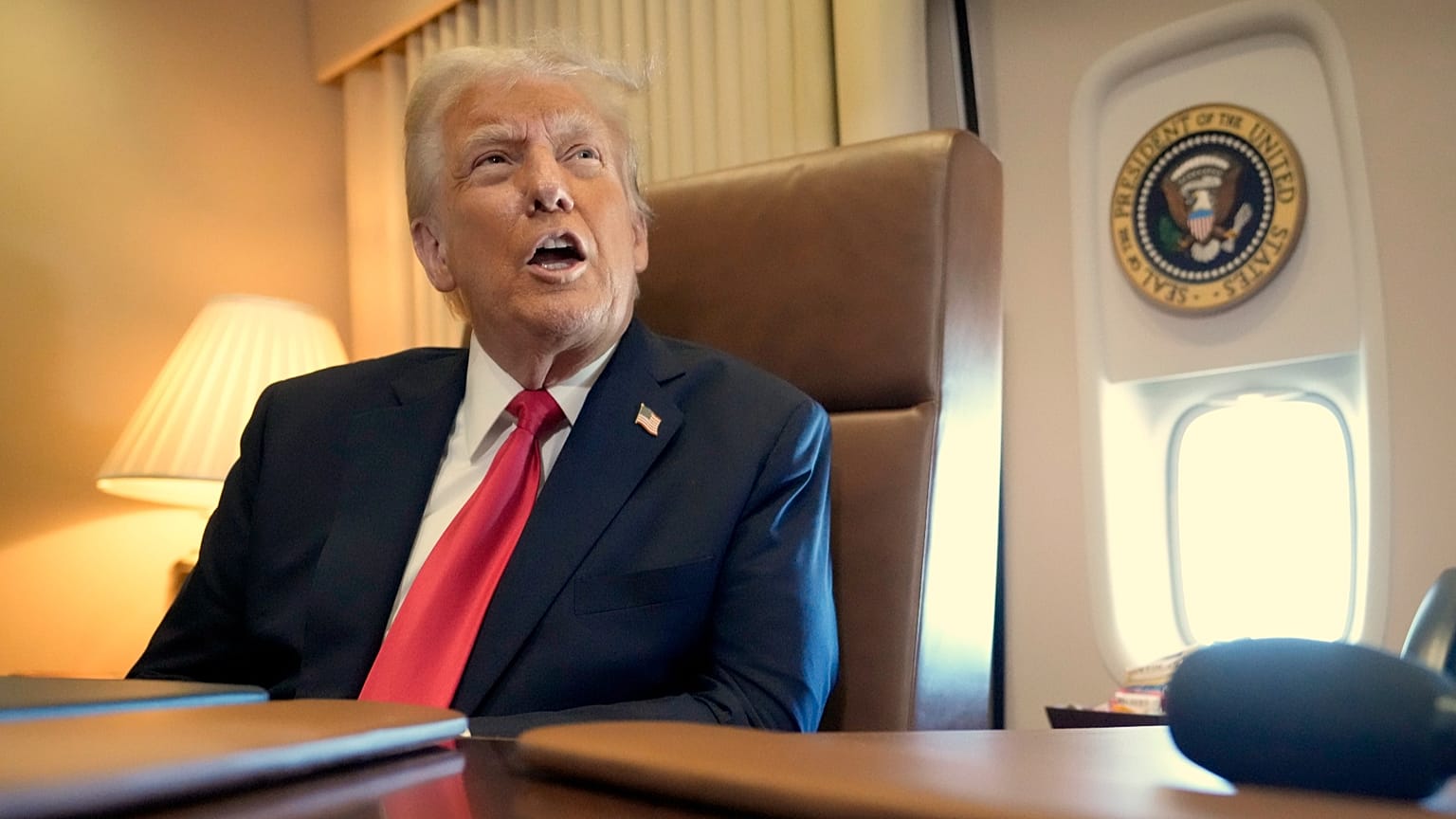 US President Donald Trump aboard Air Force One as he travels from West Palm Beach to New Orleans, 9 February 2025