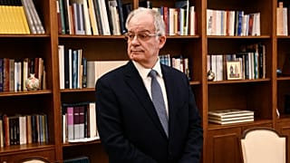 Newly elected President Constantine Tassoulas waits to receive the results of the fourth round of voting at the parliament in Athens, 12 February 2025