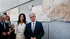 Tassoulas (à direita) numa foto de 2014