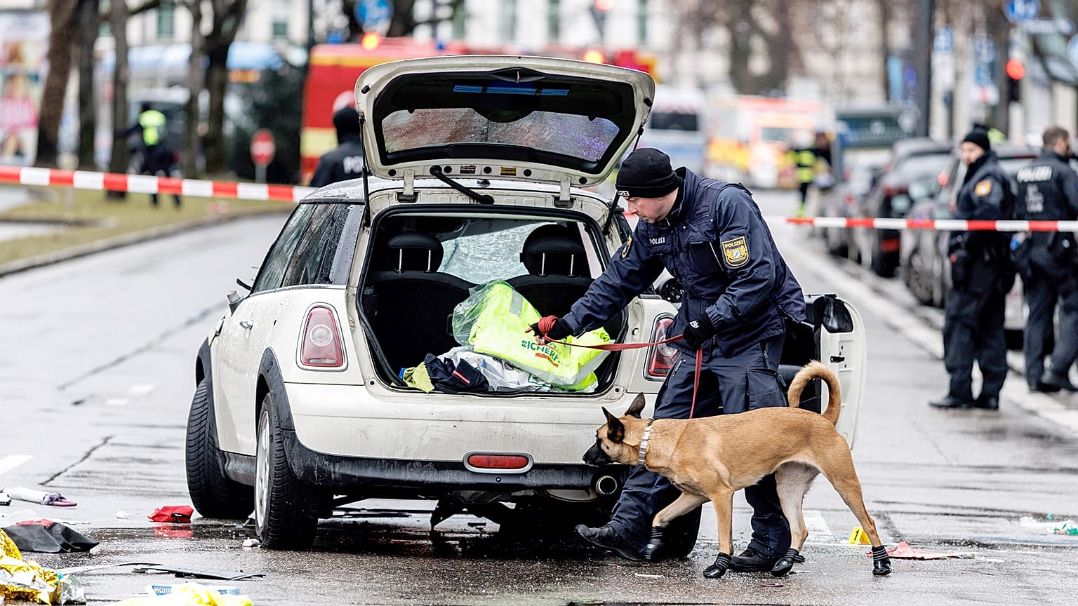 Emergency services attend the scene of an accident after a driver hit a group of people in Munich, 13 February 2025