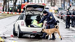 Emergency services attend the scene of an accident after a driver hit a group of people in Munich, 13 February 2025