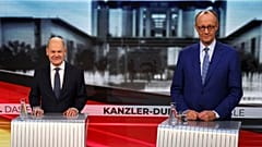 Olaf Scholz és Friedrich Merz egymás mellett