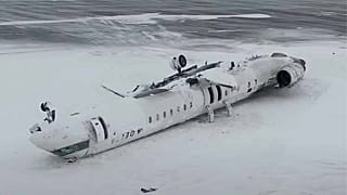 This image taken from video released by the Transportation Safety Board of Canada on Wednesday, Feb. 19, 2025, shows the crashed plane of Delta flight 4819 at Toronto airport 