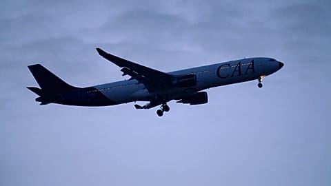A Hi Fly Airbus A330 in CAA, Compagnie Africaine d'Aviation, livery approaches for landing in Lisbon, as night falls. 2 January 2025.