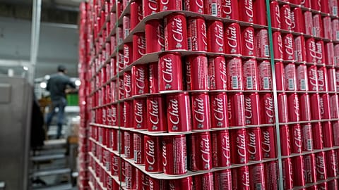 Pallets of branded cans at the production line in the Palestinian Chat Cola bottling plant, in the West Bank city of Salfit