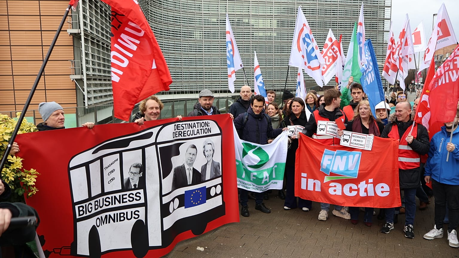Workers groups protest outside the European Parliament's Berlaymont headquarters in Brussels as the EU executive prepares an 'omnibus' package of deregulatory measures