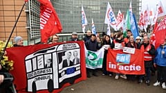 Workers groups protest outside the European Parliament's Berlaymont headquarters in Brussels as the EU executive prepares an 'omnibus' package of deregulatory measures