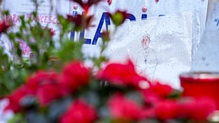 Candles and flowers for Pope Francis are seen at the Agostino Gemelli Polyclinic, in Rome, Wednesday, Feb. 26, 2025, where the Pontiff is hospitalized since Friday, Feb. 14.