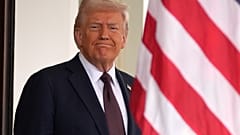 President Donald Trump stands before British Prime Minister Keir Starmer arrives at the White House, Thursday, Feb. 27, 2025, in Washington.