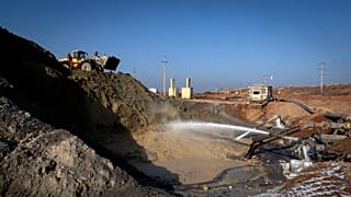 Miners extract ilmenite, a key element used to produce titanium, at an open pit mine in Kirovohrad, 12 February, 2025