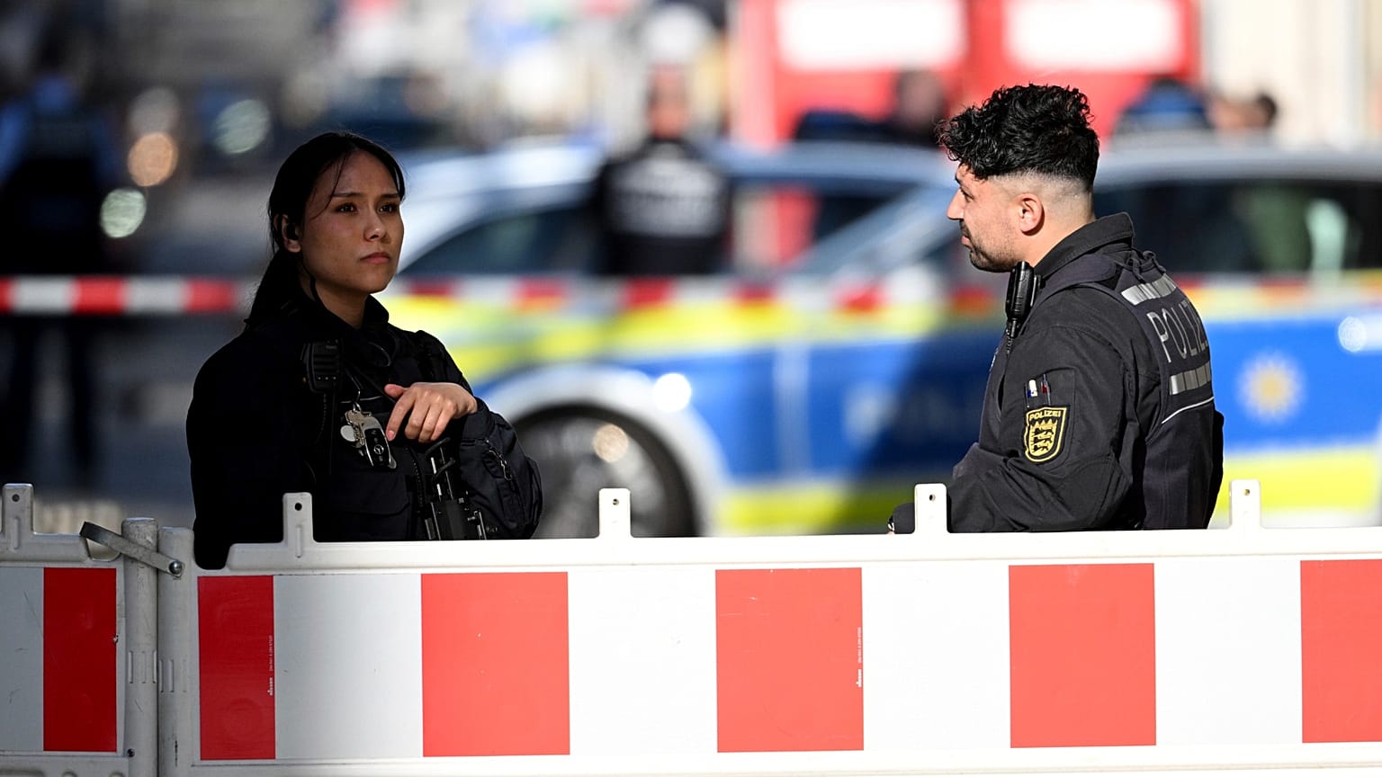 Police officers secure a street in the city center of Mannheim, 3 March 2025