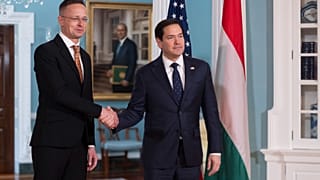 Secretary of State Marco Rubio, right, greets Hungarian Foreign Minister Péter Szijjártó in the Treaty Room at the State Department in Washington, Tuesday, March 4, 2025. (AP 