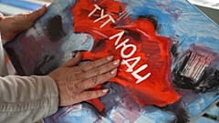 "Hier gibt es Menschen" auf der Karte der Ukraine. Das Zeichen, das von ukrainischen Zivilisten während der russischen Besatzung verwendet wurde 