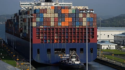 A cargo ship goes through the Panama Canal's Cocoli locks in Panama City on 21 February, 2025.