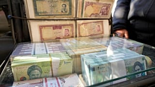 کاهش ارزش پول در ایران