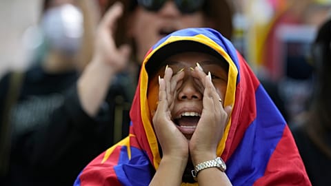 Exiled Tibetans shout slogans during a protest to commemorate the 1959 uprising in Tibet against the Chinese, in New Delhi, India, Monday, March, 10, 2025.