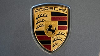 File photo of the Porsche logo on a Porsche automobile on display at the Pittsburgh International Auto Show in Pittsburgh, Feb. 14, 2025. 
