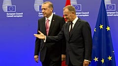 Turkish President Recep Tayyip Erdogan greeted by European Council President Donald Tusk prior to a meeting at the EU Council building in Brussels on Monday, Oct. 5, 2015.