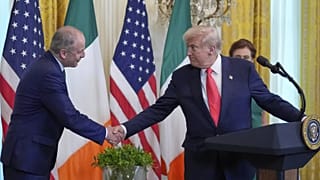 Ireland's Prime Minister Micheál Martin shakes hands with President Donald Trump during an event in the East Room of the White House in Washington, Wednesday, March 12, 2025.