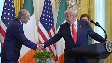 Ireland's Prime Minister Micheál Martin shakes hands with President Donald Trump during an event in the East Room of the White House in Washington, Wednesday, March 12, 2025.