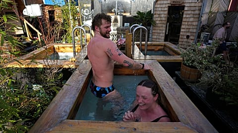 Callum Heinrich, left, and Ella Price, enjoy their sauna session at the Hackney Wick Community Sauna Baths, in London, Tuesday, Feb. 25, 2025.