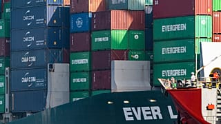 Shipping containers are seen stacked on the Evergreen terminal at the Port of Los Angeles in San Pedro, California. 30 November 2021.