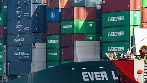 Shipping containers are seen stacked on the Evergreen terminal at the Port of Los Angeles in San Pedro, California. 30 November 2021.