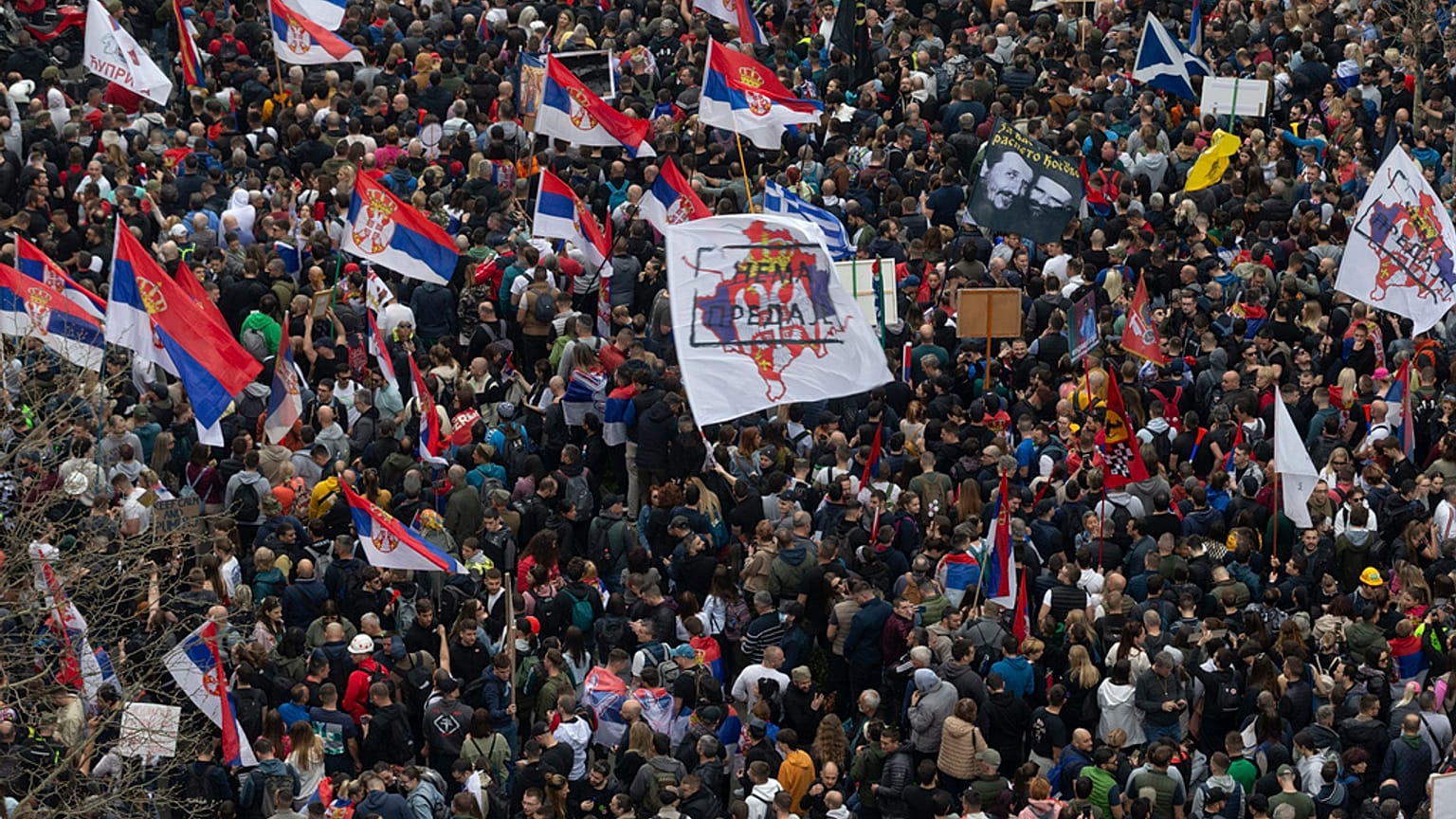 Protesters march during a major rally against President Aleksandar Vucic and his government, in downtown Belgrade, Serbia, Saturday, March 15, 2025. (AP Photo/Armin Durgut)