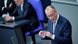 German opposition leader and Christian Democratic Union party chairman Friedrich Merz speaks during a debate and voting about loosen the country's debt rules, 18 March 2025.