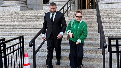 Lisa Schiff, right, walks out of Manhattan federal court after pleading guilty to wire fraud - Wednesday 19 March 2025,