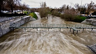 The Manzanares River as it flows through Madrid after heavy rains, Spain, Friday, March 21, 2025.
