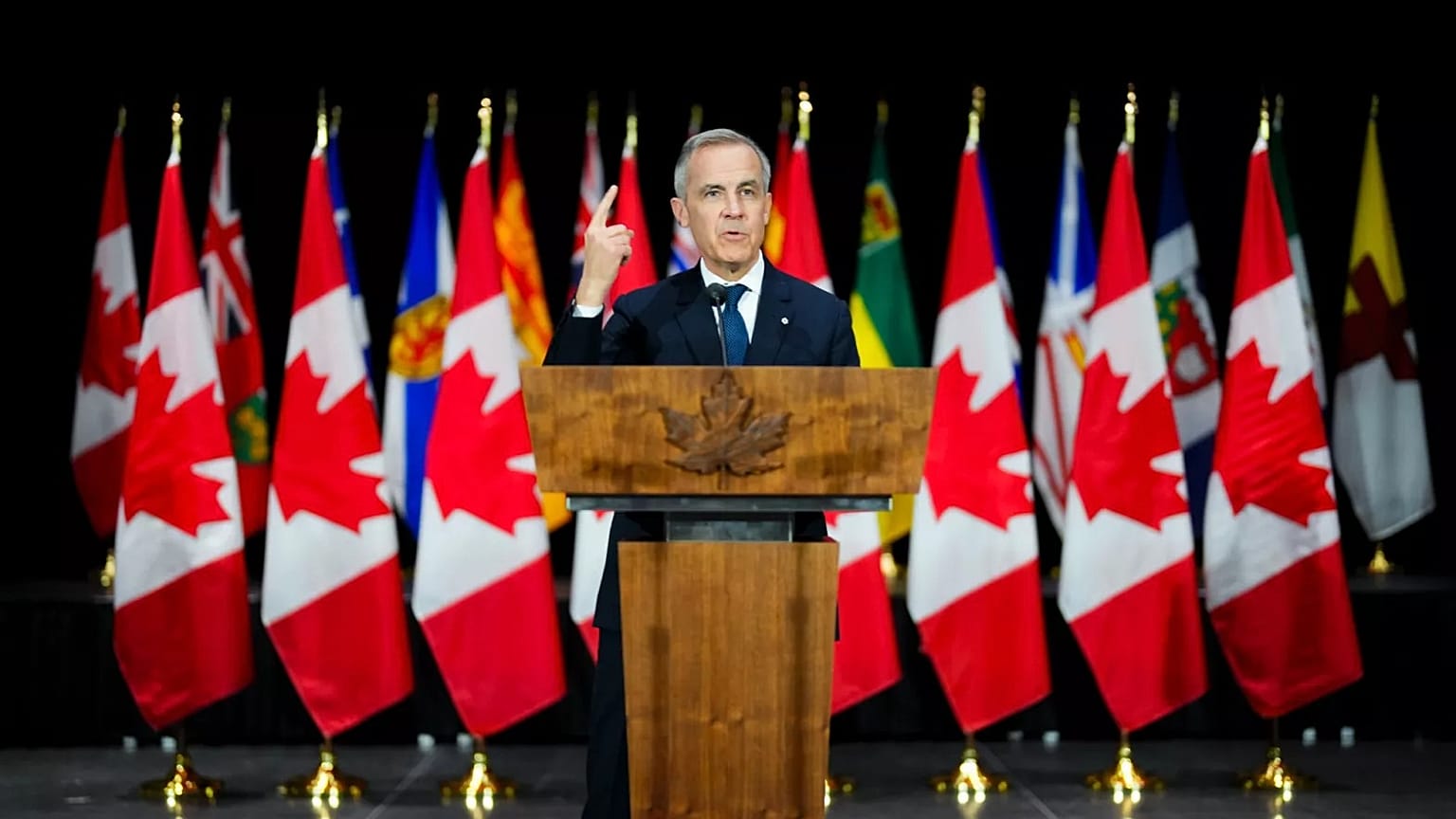 Canada's Prime Minister Mark Carney holds a press conference at the National War Museum, 21 March 2025