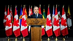 Canada's Prime Minister Mark Carney holds a press conference at the National War Museum, 21 March 2025